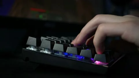 Addicted Minecraft Gamer using Gaming Keyboard Stock Footage 146464089