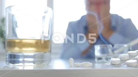Addicted Person Drink Alcohol and Consume Drugs Stock Photos