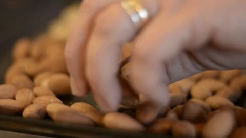 Adding almonds to muesli 動画素材 85693776