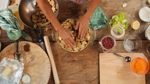 Adding Apples into Pie Crust Top View, 4K Stock Footage 148186826