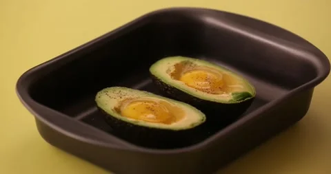 Adding bacon to eggs and avocado 2 Video stock 132149582