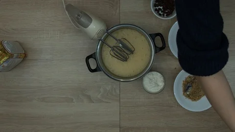 Adding Baking Powder In A Bowl With Mixture Video stock 87504409