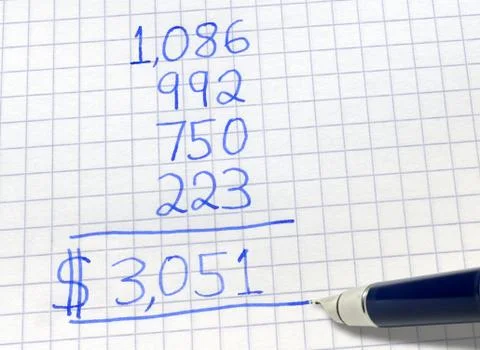 Adding up bills. Photos