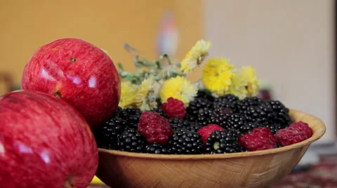 Adding Blackberry to the Bowl Stock Footage 55634169