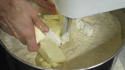 Adding butter in a mixer to knead bread dough_2 스톡 동영상 251368415
