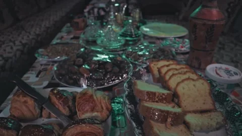 Adding cake to your Ramadan breakfast table Stock Footage 303967073