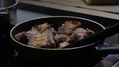 Adding carrot and onion to beef Stock Footage 120462635