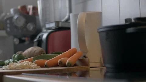 Adding celery to a soup Stock Footage 103002903