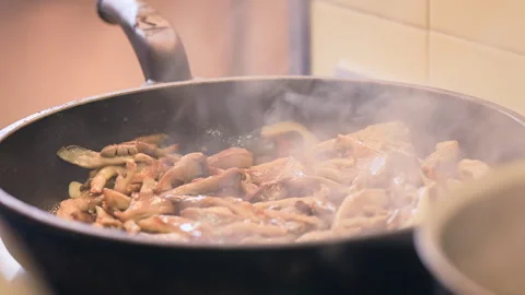 Adding cheese and soy sauce to cooking mushroom Stock-Footage 276602367