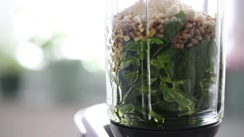 Adding cheese into blender Stock Footage 200959243