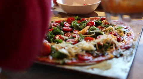 Adding cheese to a homemade pizza Stock Footage 45515650
