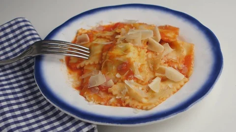Adding cheese to ravioli Stock-Footage 76255433
