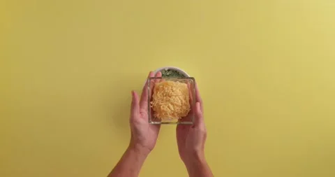 Adding cheese to the spinach dip 1 Stock Footage 132194686