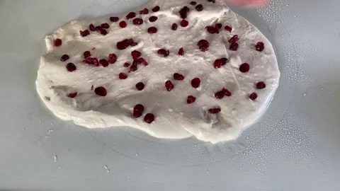 Adding cherries for baking Stock Footage 341983148