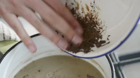 Adding chocolate Stock Footage 140268449