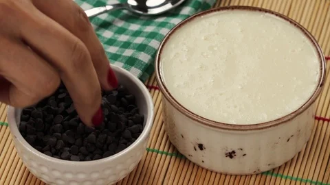 Adding Chocolate To Pudding Stock Footage 104554011