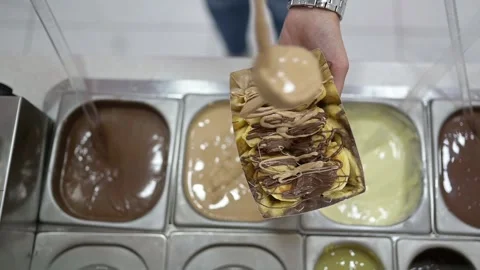 Adding chocolate sauce to American pancakes looks very tasty Stock Footage 168945605