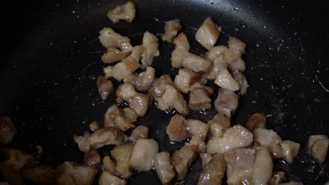 Adding chopped onions in the pan Stock Footage 112746559