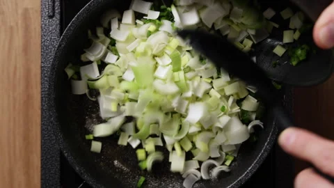 Adding Chopped Vegetables Into Pan Top View Видео 337189861