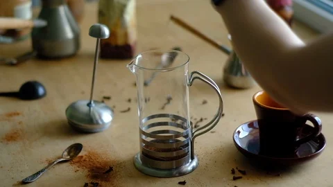 Adding coffee grounds into french press in slow motion Stock Footage 88355402