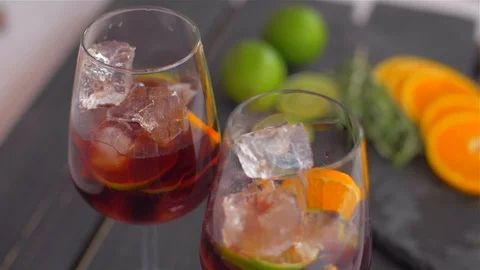 Adding Cognac to Sangria with Fruits Stock Footage 110046247