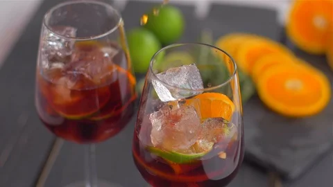 Adding Cognac to Sangria with Fruits Video stock 110046734