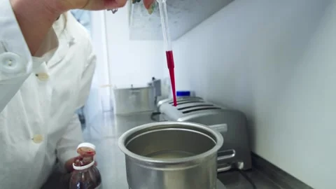 Adding colorant to food Stock Footage 315505742