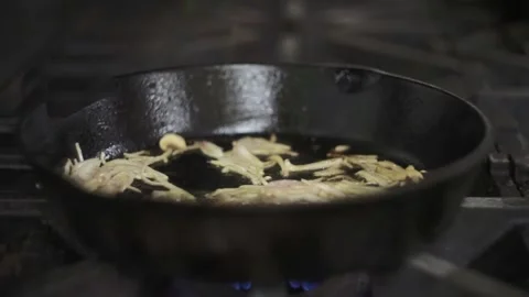 Adding condiments in cooking mushrooms Stock-Footage 307340090
