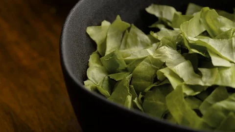Adding Cucmber to Cobb Salad Stock Footage 116787256