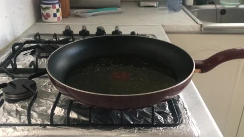 Adding Cuttlefishes On A Pan Stock Footage 130916219