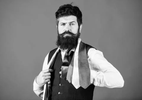 Adding a dose of class to his style of dress. Man of fashion. Brutal caucasian Stock Photos