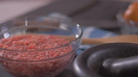 Adding dry spices to the minced meat mince Stock Footage 112177788