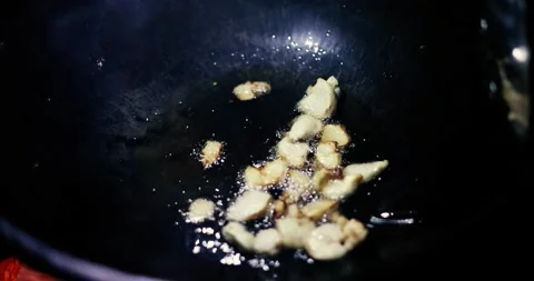 Adding fat tail fat into a hot cauldron while cooking pilaf	 Video stock 168181118