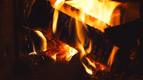 Adding firewood in furnace Stock Footage 31216575
