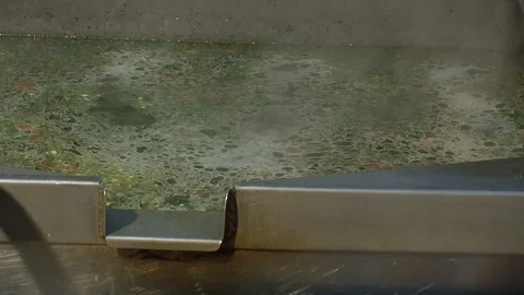 Adding fish to fish soup. Cooking process. close-up  Stock Footage 90722464