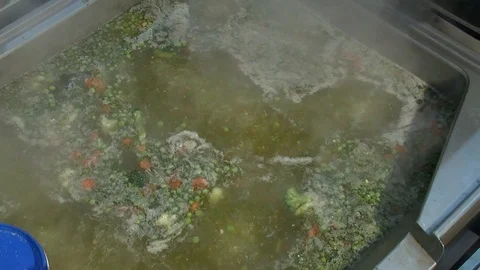 Adding fish to fish soup. Cooking process. close-up  Stock Footage 90723464