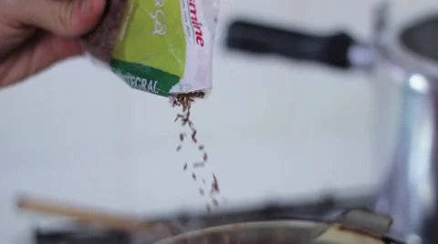 Adding flax seed Stock Footage 35221639