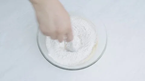 Adding Flour Into Batter Mixing With Spoon Top View Vidéo 332810017