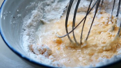 Adding Flour Into Bowl And Mix It Stock Footage 128643238