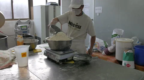 Adding Flour To The Bread Making Machine - 4K Stock Footage 51328391