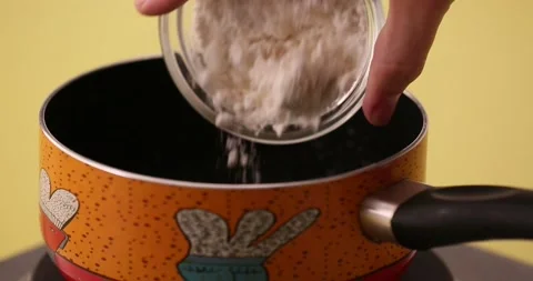 Adding flour to butter and mixing in a pan 2 Stock Footage 132146378