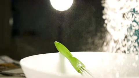 Adding Flour powder into the bowl Stock Footage 124961232