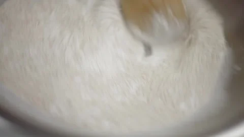 Adding flour to the tortilla mix Stock-Footage 307340074