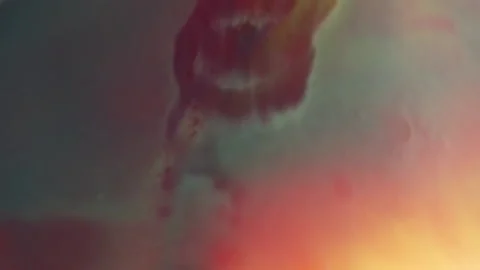 Adding fluid to the bottom of a multicolor abstract Stock Footage 235816946