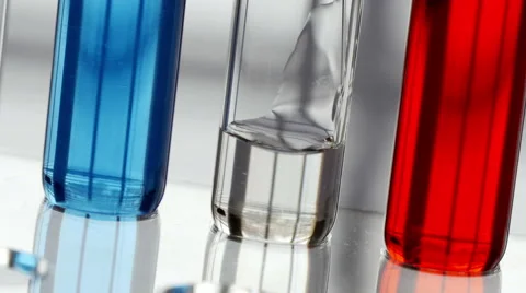 Adding fluid to test tube in laboratory Stock Footage 49760162