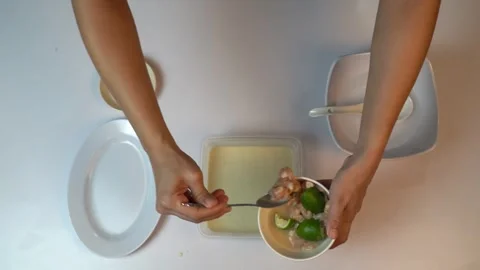 Adding Fresh Shrimps into Flour Batter Mix for Deep Frying 스톡 동영상 334306137