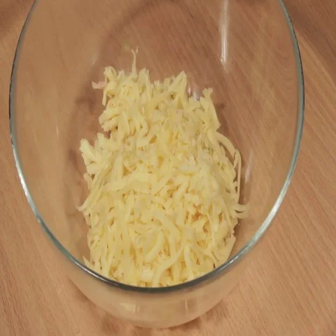 Adding garlic to the cheese Stock Footage 69412959