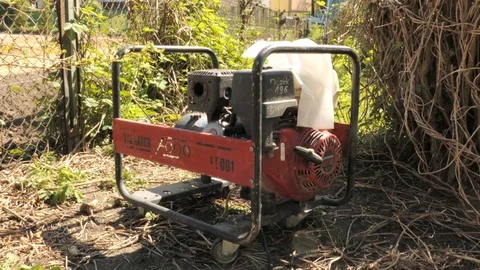 Adding gasoline to the generator Stock-Footage 89606084
