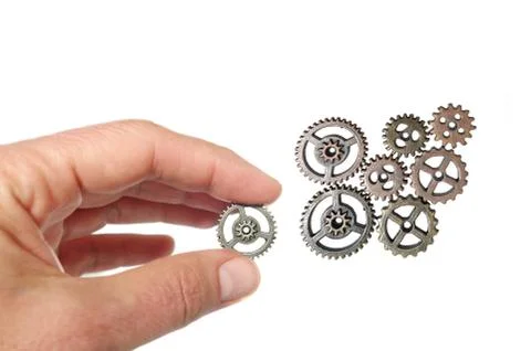 Adding a gear Stock Photos