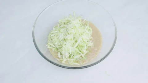 Adding Grated Zucchini And Mixing Batter With Fork Stockbeeldmateriaal 332810074
